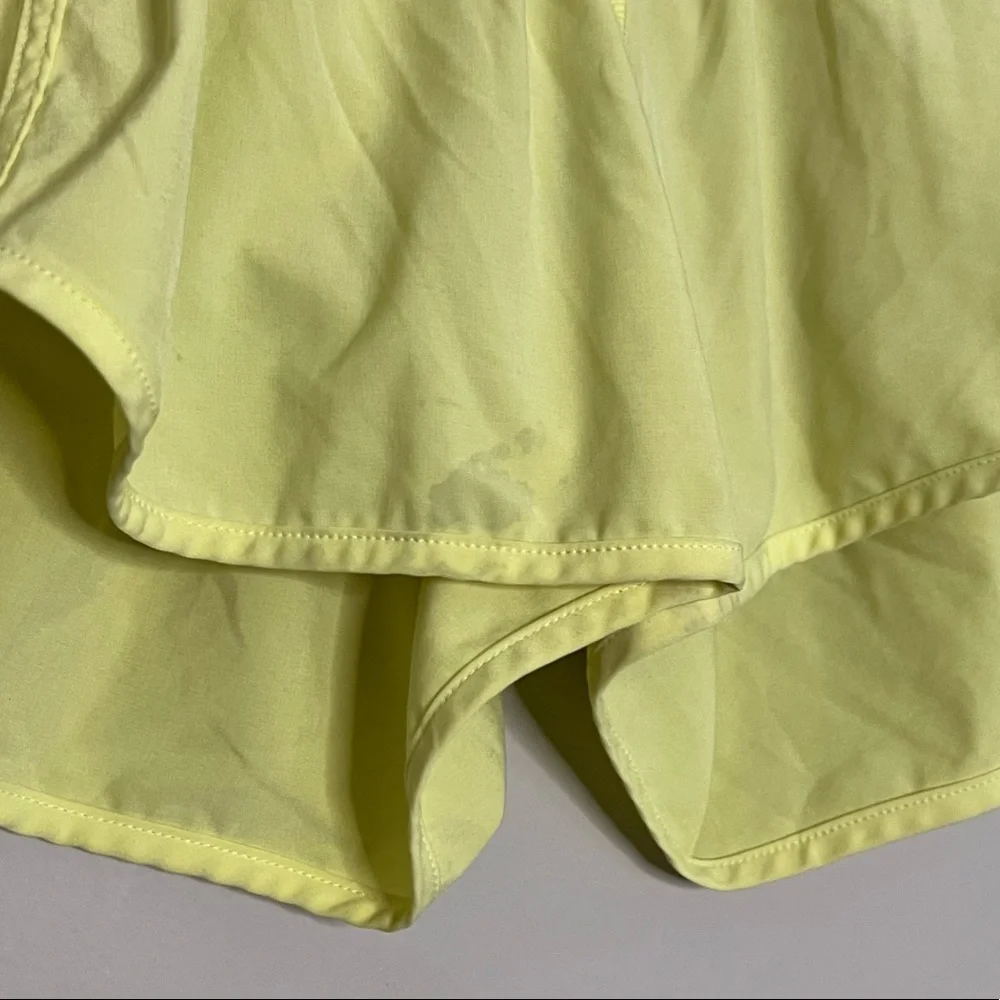 Lululemon Tracker Yellow Shorts with Multicolored Dot patterned waistband